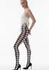 Woman wearing a white top and houndstooth patterned tights on a white background