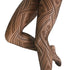 Patterned tights worn by a person on a white background