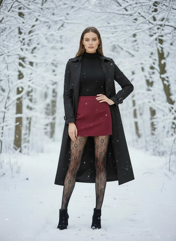 Black lace fleece-lined tights being worn in winter white background .