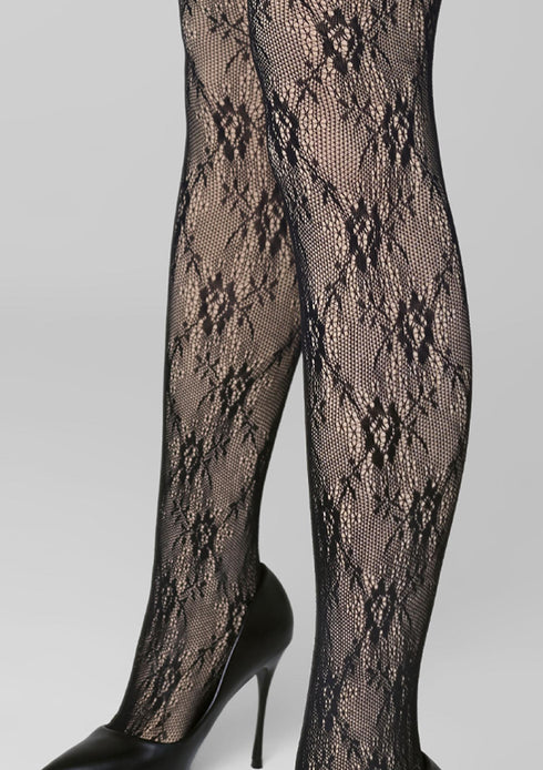 Black lace fleeced lined fishnet stockings on a white background
