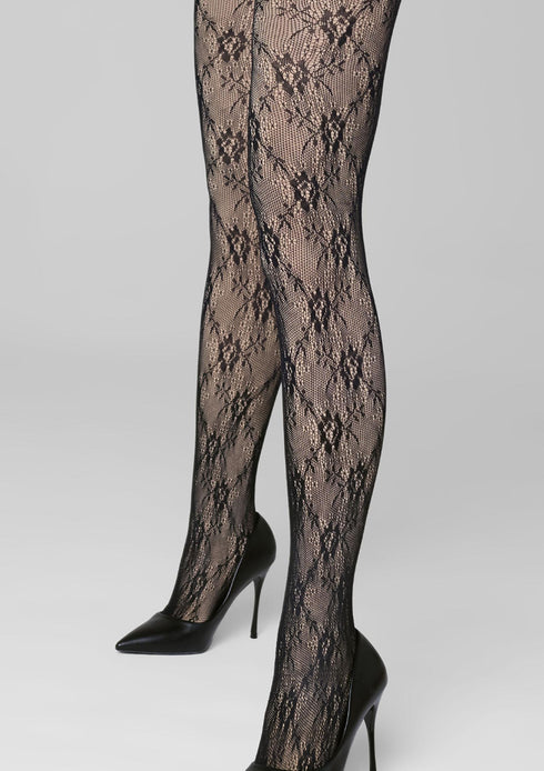 Black lace fleeced lined fishnet stockings on a white background