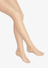Beige tights worn by a person on a white background