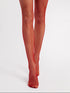 Red fishnet stockings with red lace thigh band on a white background