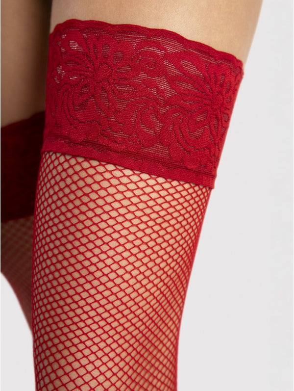 Red lace top and fishnet stockings on a neutral background