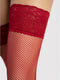 Red lace top and fishnet stockings on a neutral background
