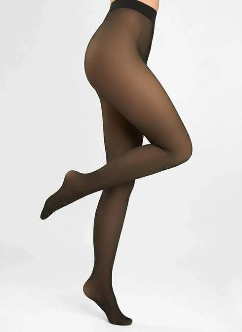 Sheer illusion, thermal tights worn by a model on a white background