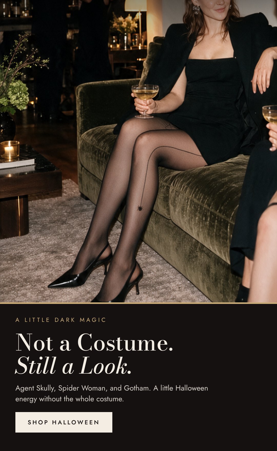 Woman in sheer black tights with a back seam, seated at a cocktail party